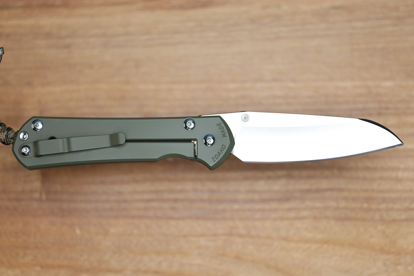 CHRIS REEVE KNIVES LARGE SEBENZA 31 NWK EXCLUSIVE - INSINGO BLADE / CPM-MAGNACUT STEEL / OD GREEN CERAKOTE HANDLE / CAMO LANYARD (PREOWNED)