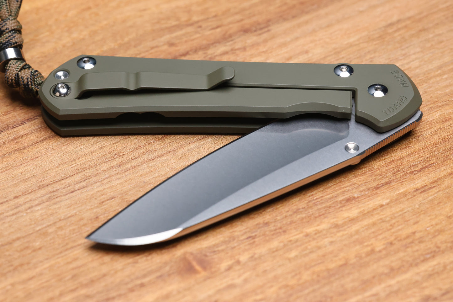 CHRIS REEVE KNIVES LARGE SEBENZA 31 NWK EXCLUSIVE - INSINGO BLADE / CPM-MAGNACUT STEEL / OD GREEN CERAKOTE HANDLE / CAMO LANYARD (PREOWNED)