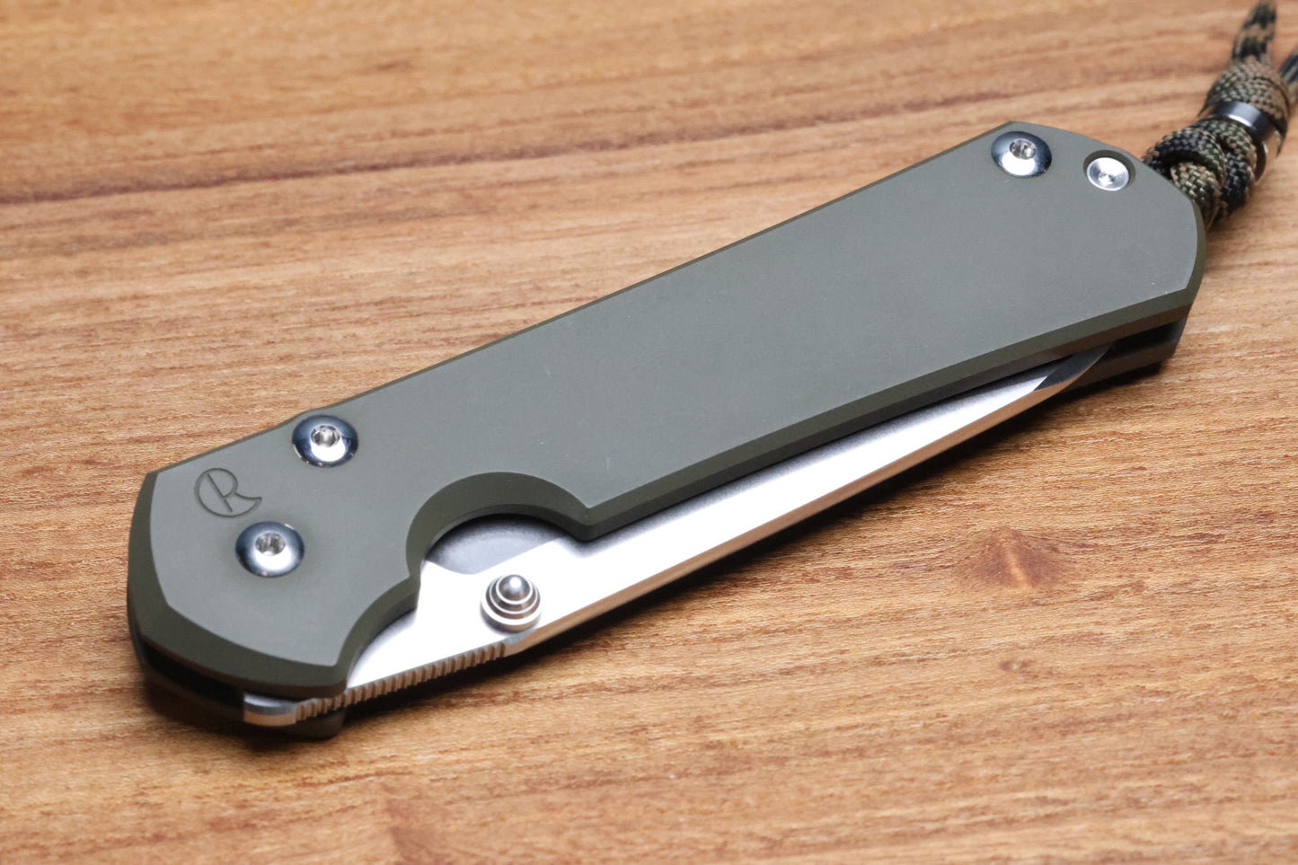 CHRIS REEVE KNIVES LARGE SEBENZA 31 NWK EXCLUSIVE - INSINGO BLADE / CPM-MAGNACUT STEEL / OD GREEN CERAKOTE HANDLE / CAMO LANYARD (PREOWNED)