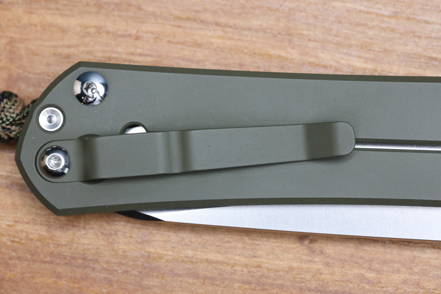 CHRIS REEVE KNIVES LARGE SEBENZA 31 NWK EXCLUSIVE - INSINGO BLADE / CPM-MAGNACUT STEEL / OD GREEN CERAKOTE HANDLE / CAMO LANYARD (PREOWNED)