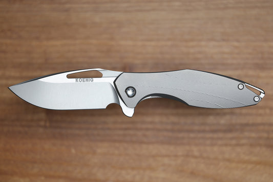 KOENIG MINI ARIUS - PATTERNED TITANIUM HANDLE - SILVER HARDWARE - BURNISHED W/ POLISHED FLATS M390 BLADE