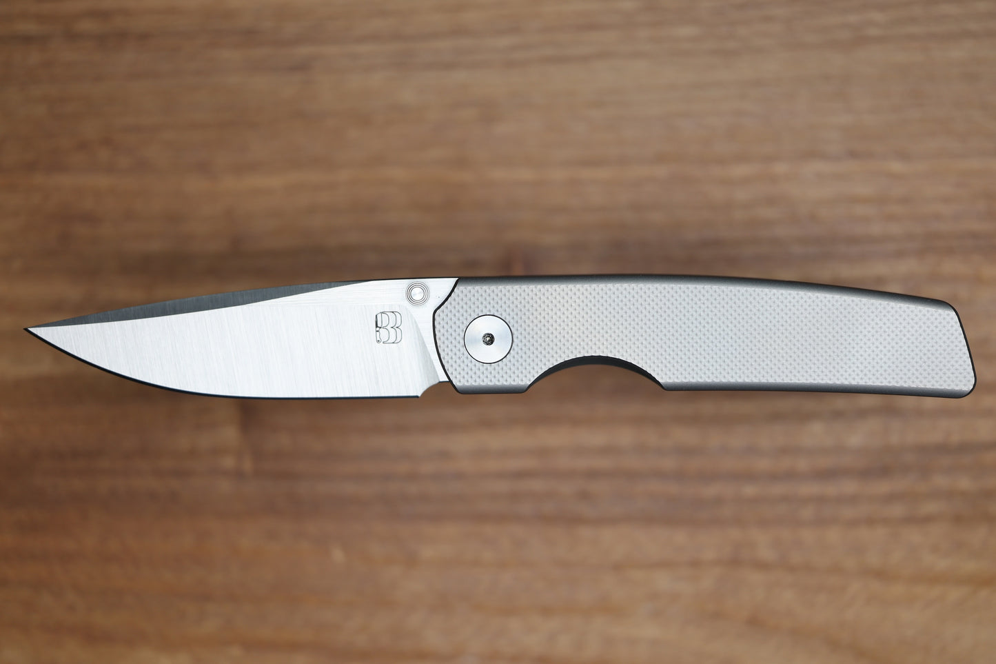 BERG BLADES SWEENEY V2 THUMBSTUD BEAD BLAST DIAMOND PATTERN TITANIUM FOLDER 3.35" BELT SATIN