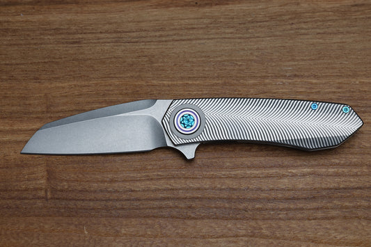 SKIFF MADE BLADES ASYLUM #83, STONEWASHED BLADE, MILLED TITANIUM SCALES, SEAFOAM ACCENTS