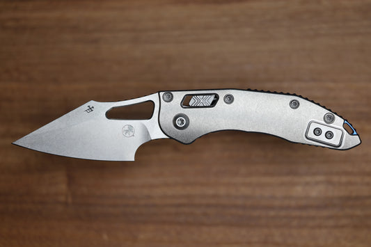 MARFIONE SELECT MANUAL M-STITCH RAM LOK SLAB SIDE TITANIUM HANDLES W/ BLUE ACCENTS & STONEWASH M390MK 169MRL-10MS2