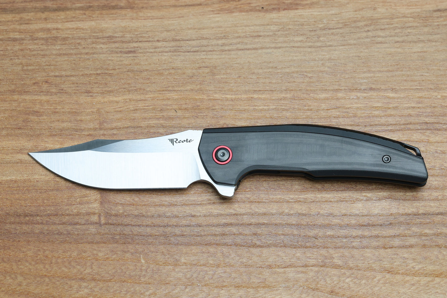 REATE KNIVES JACK JR. BLACK ALUMINUM INTEGRAL HANDLE W/ CARBON FIBER INLAY & RED PIVOT COLLAR & SATIN S30V