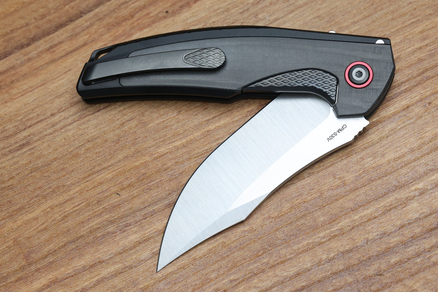 REATE KNIVES JACK JR. BLACK ALUMINUM INTEGRAL HANDLE W/ CARBON FIBER INLAY & RED PIVOT COLLAR & SATIN S30V