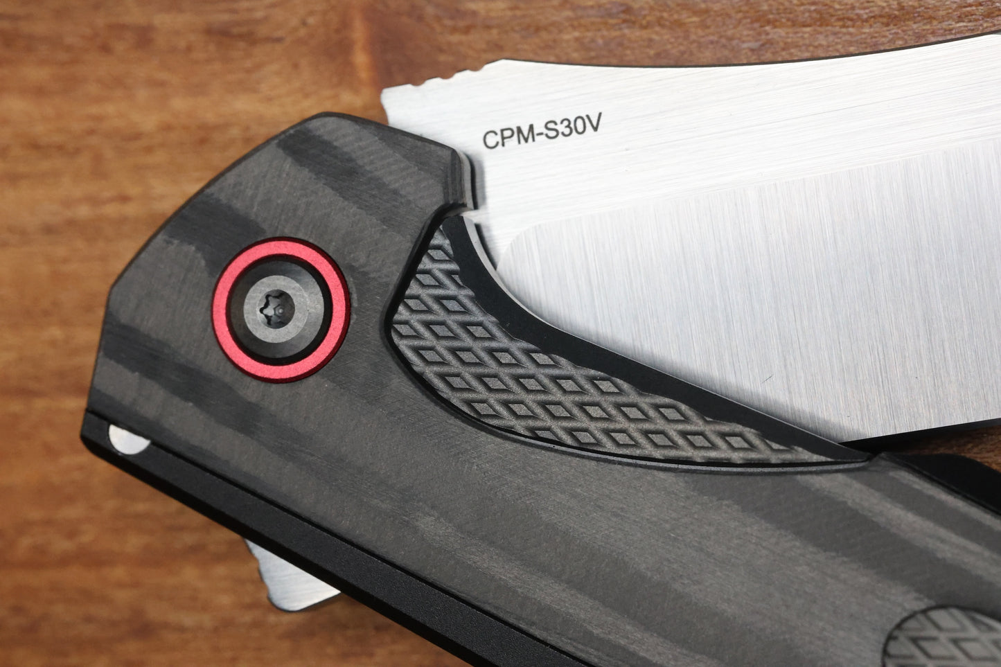 REATE KNIVES JACK JR. BLACK ALUMINUM INTEGRAL HANDLE W/ CARBON FIBER INLAY & RED PIVOT COLLAR & SATIN S30V