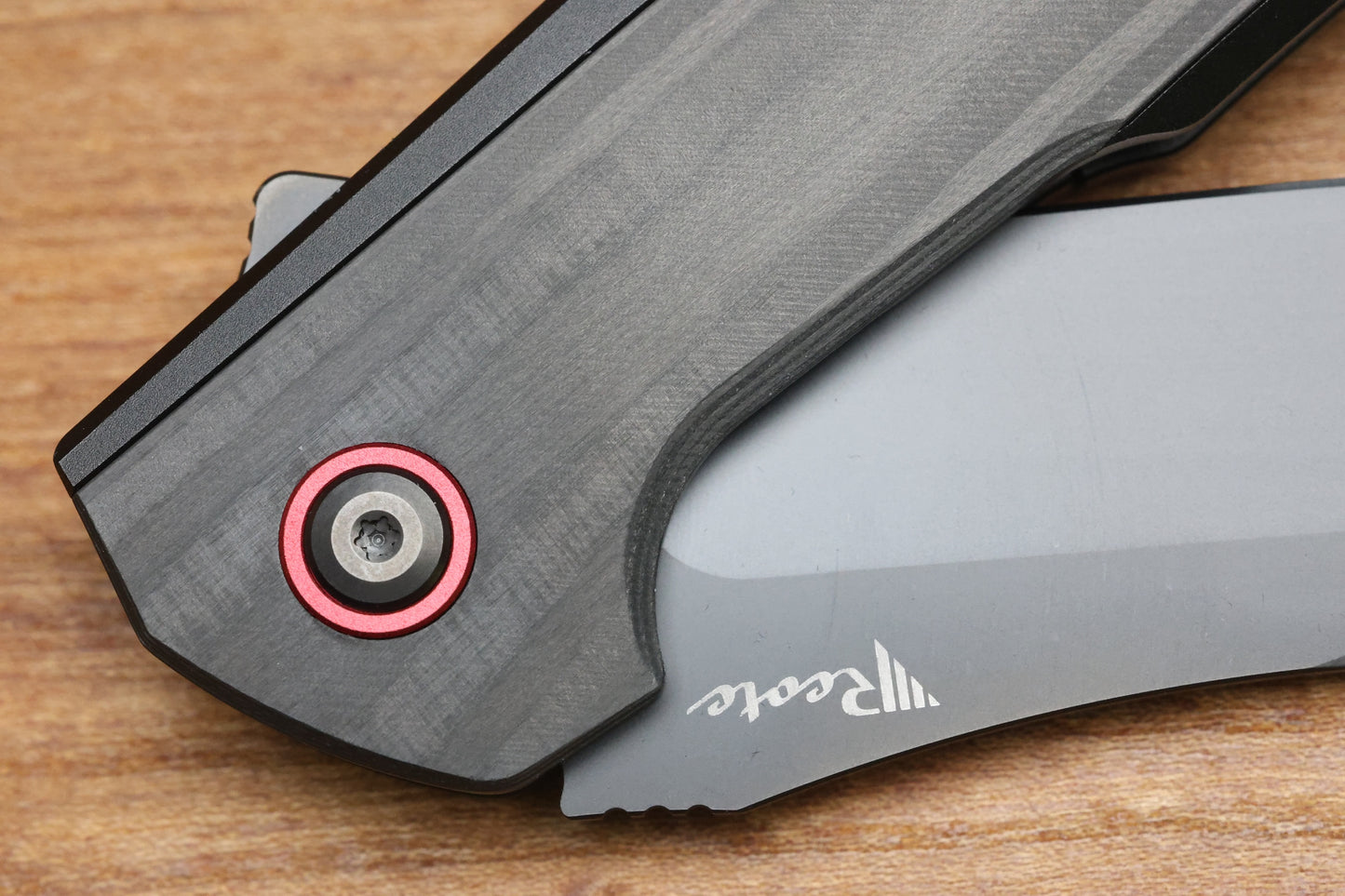 REATE KNIVES JACK JR. BLACK ALUMINUM INTEGRAL HANDLE W/ CARBON FIBER INLAY & RED PIVOT COLLAR & DLC S30V
