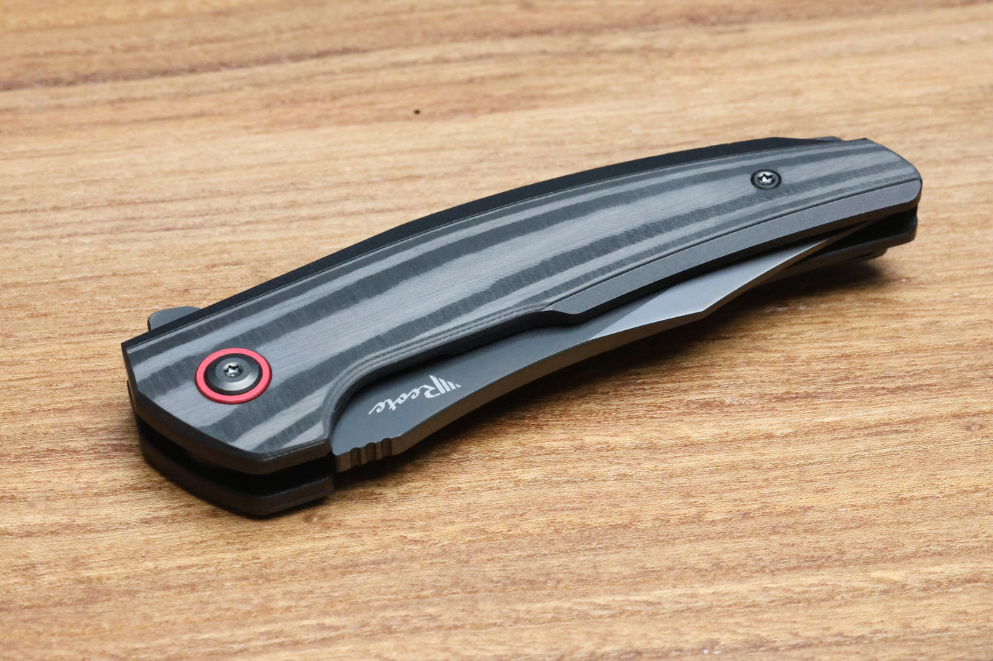 REATE KNIVES JACK JR. BLACK ALUMINUM INTEGRAL HANDLE W/ CARBON FIBER INLAY & RED PIVOT COLLAR & DLC S30V