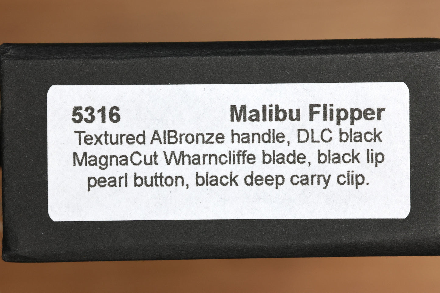 PRO-TECH MALIBU ALBRONZE TEXTURED HANDLE W/ BLACK LIP PEARL BUTTON & DLC MAGNACUT WHARNCLIFFE BLADE 5316