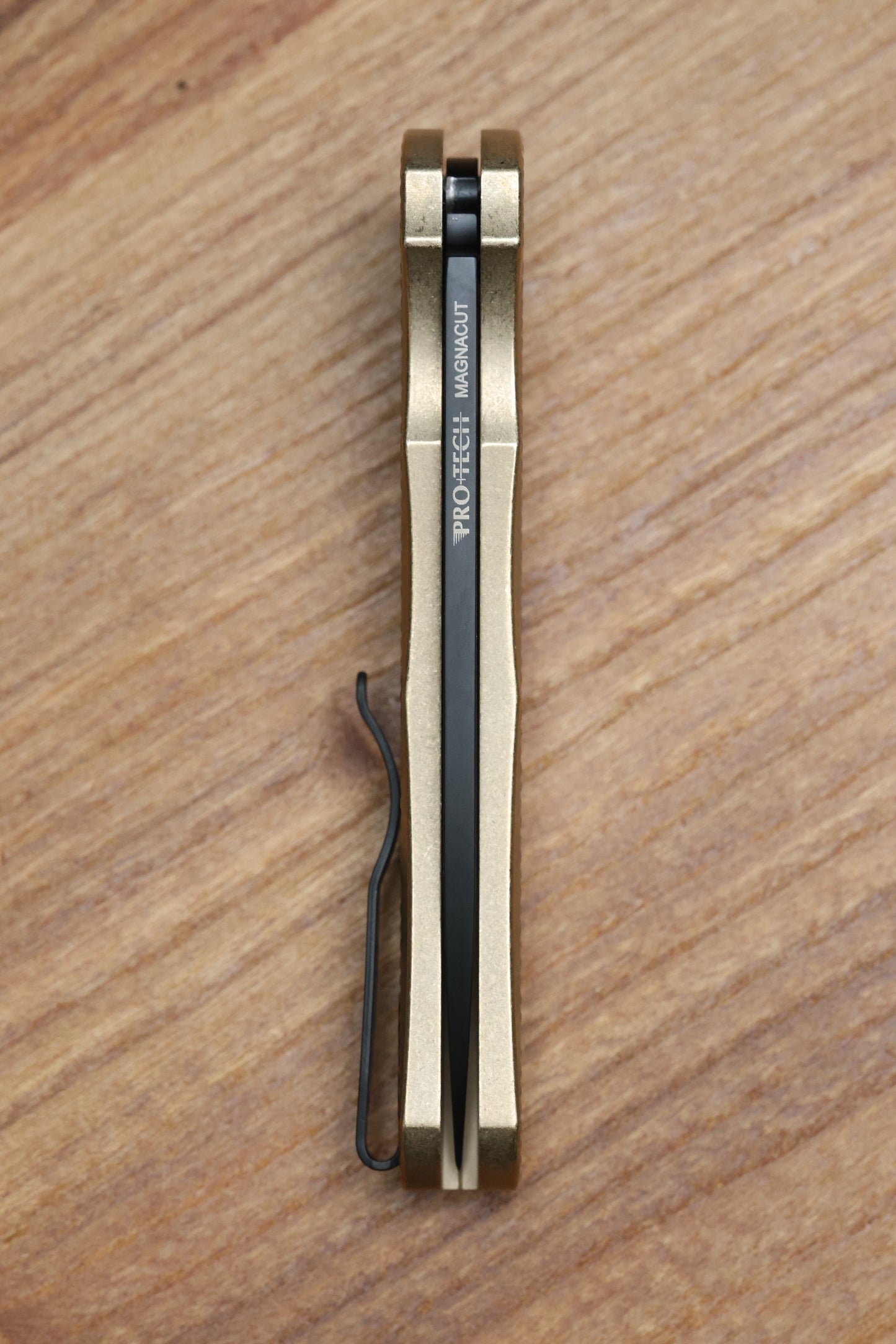 PRO-TECH MALIBU ALBRONZE TEXTURED HANDLE W/ BLACK LIP PEARL BUTTON & DLC MAGNACUT WHARNCLIFFE BLADE 5316