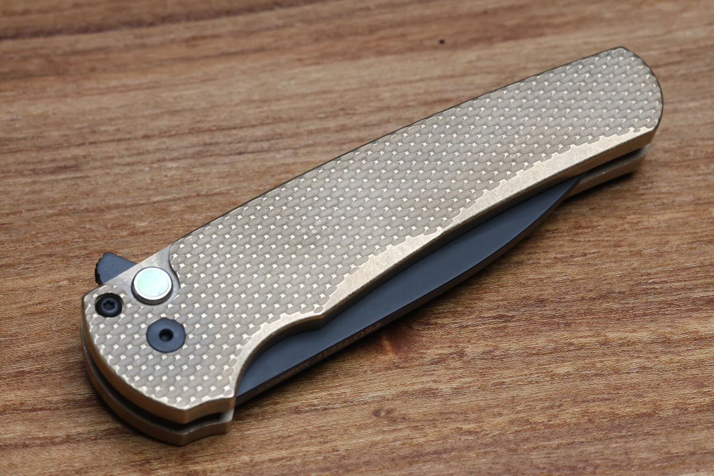 PRO-TECH MALIBU ALBRONZE TEXTURED HANDLE W/ BLACK LIP PEARL BUTTON & DLC MAGNACUT WHARNCLIFFE BLADE 5316