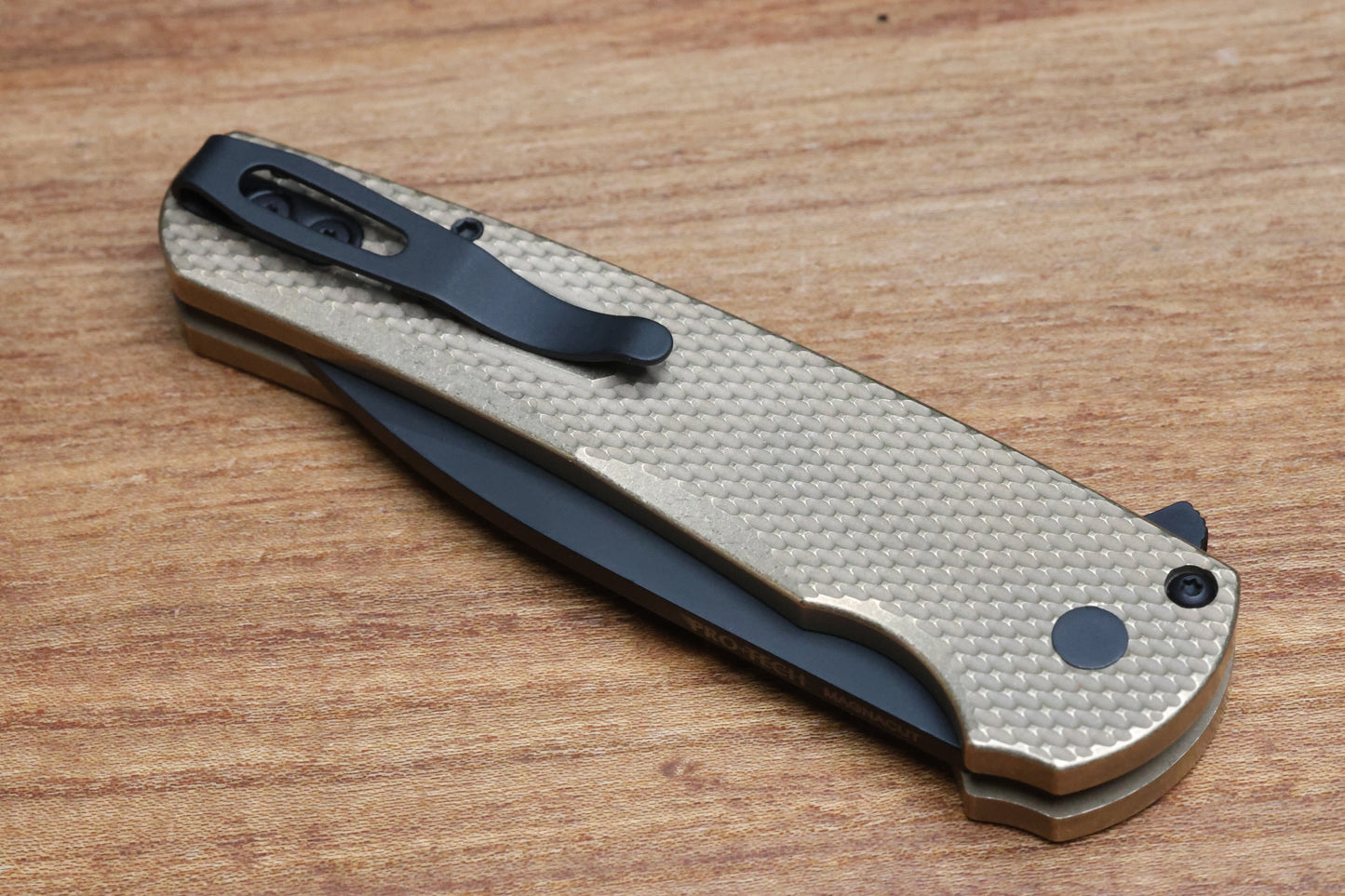 PRO-TECH MALIBU ALBRONZE TEXTURED HANDLE W/ BLACK LIP PEARL BUTTON & DLC MAGNACUT WHARNCLIFFE BLADE 5316