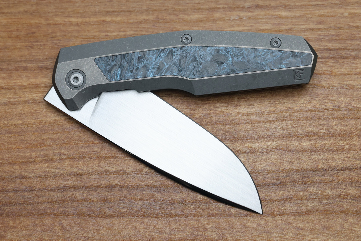 CUSTOM KNIFE FACTORY FIF18 TUMBLED TITANIUM HANDLES W/ BLUE CARBON FIBER INLAY & M398