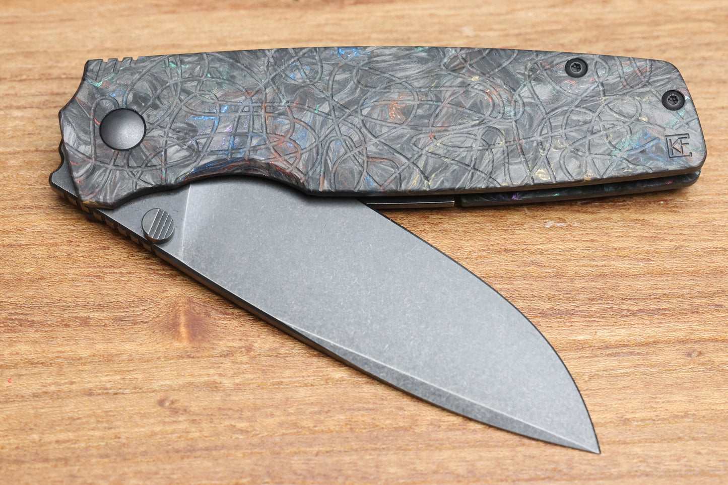 CUSTOM KNIFE FACTORY LEX CARBON FIBER RAINBOW M398 BLADE