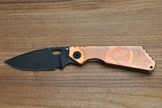 STRIDER KNIVES SMF BLACK PD#1 BLADE, COPPER TOP, HEAT TREATED TITANIUM FRAME