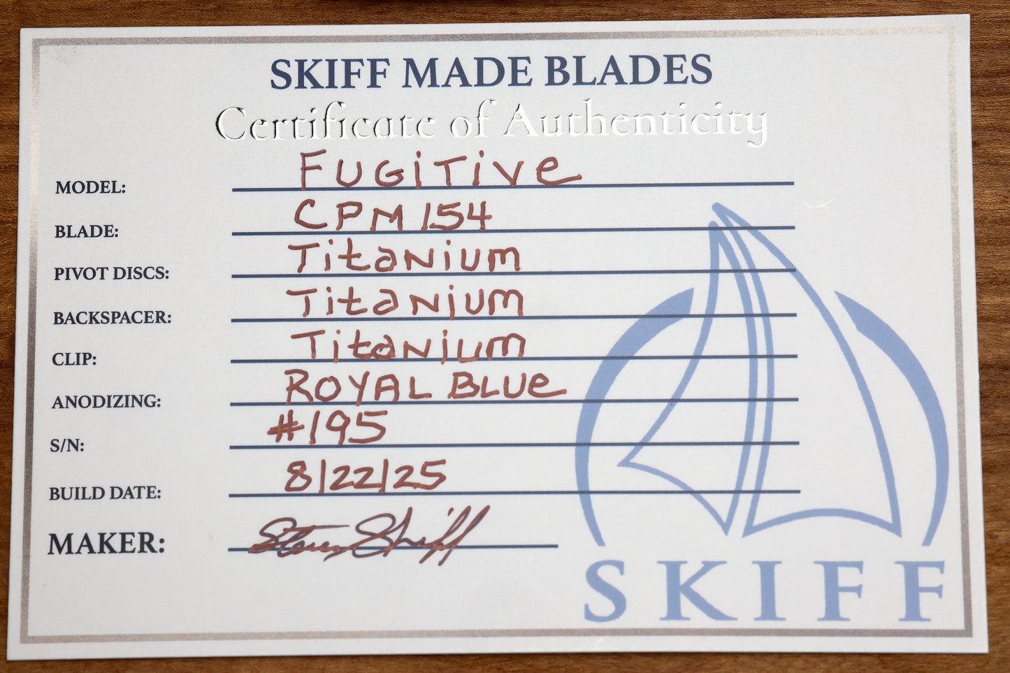 SKIFF MADE BLADES FUGITIVE- CPM154 BLADE, MILLED TITANIUM SCALES, ROYAL BLUE TI BACKSPACER, PIVOT COLLAR AND CLIP, #195