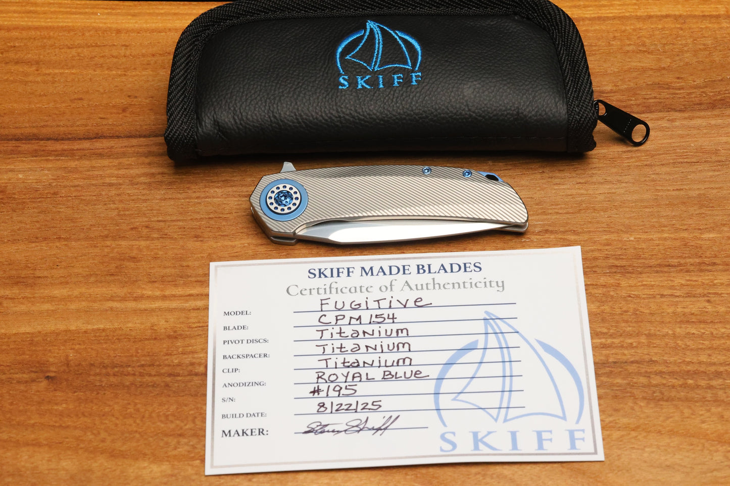 SKIFF MADE BLADES FUGITIVE- CPM154 BLADE, MILLED TITANIUM SCALES, ROYAL BLUE TI BACKSPACER, PIVOT COLLAR AND CLIP, #195