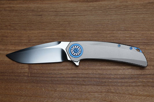 SKIFF MADE BLADES FUGITIVE- CPM154 BLADE, MILLED TITANIUM SCALES, ROYAL BLUE TI BACKSPACER, PIVOT COLLAR AND CLIP, #195