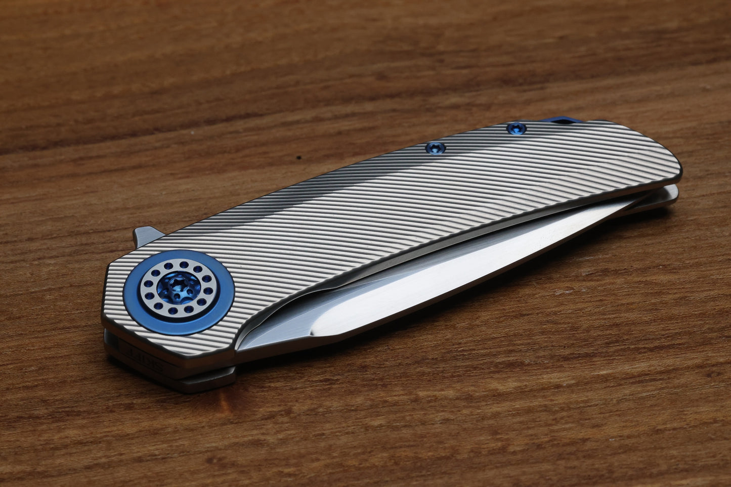 SKIFF MADE BLADES FUGITIVE- CPM154 BLADE, MILLED TITANIUM SCALES, ROYAL BLUE TI BACKSPACER, PIVOT COLLAR AND CLIP, #195