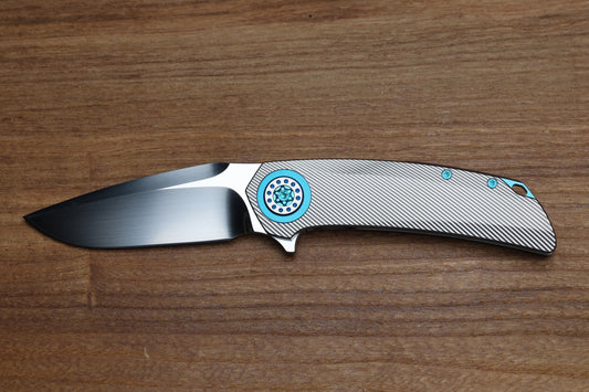 SKIFF MADE BLADES FUGITIVE- CPM154 BLADE, MILLED TITANIUM SCALES, SEA FOAM TI BACKSPACER, PIVOT COLLAR AND CLIP, #201