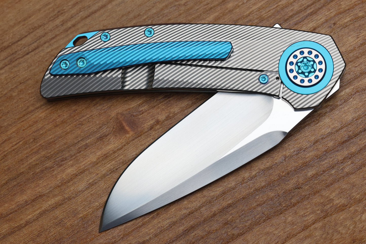 SKIFF MADE BLADES FUGITIVE- CPM154 BLADE, MILLED TITANIUM SCALES, SEA FOAM TI BACKSPACER, PIVOT COLLAR AND CLIP, #201