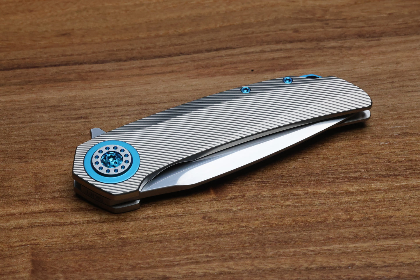 SKIFF MADE BLADES FUGITIVE- CPM154 BLADE, MILLED TITANIUM SCALES, SEA FOAM TI BACKSPACER, PIVOT COLLAR AND CLIP, #201