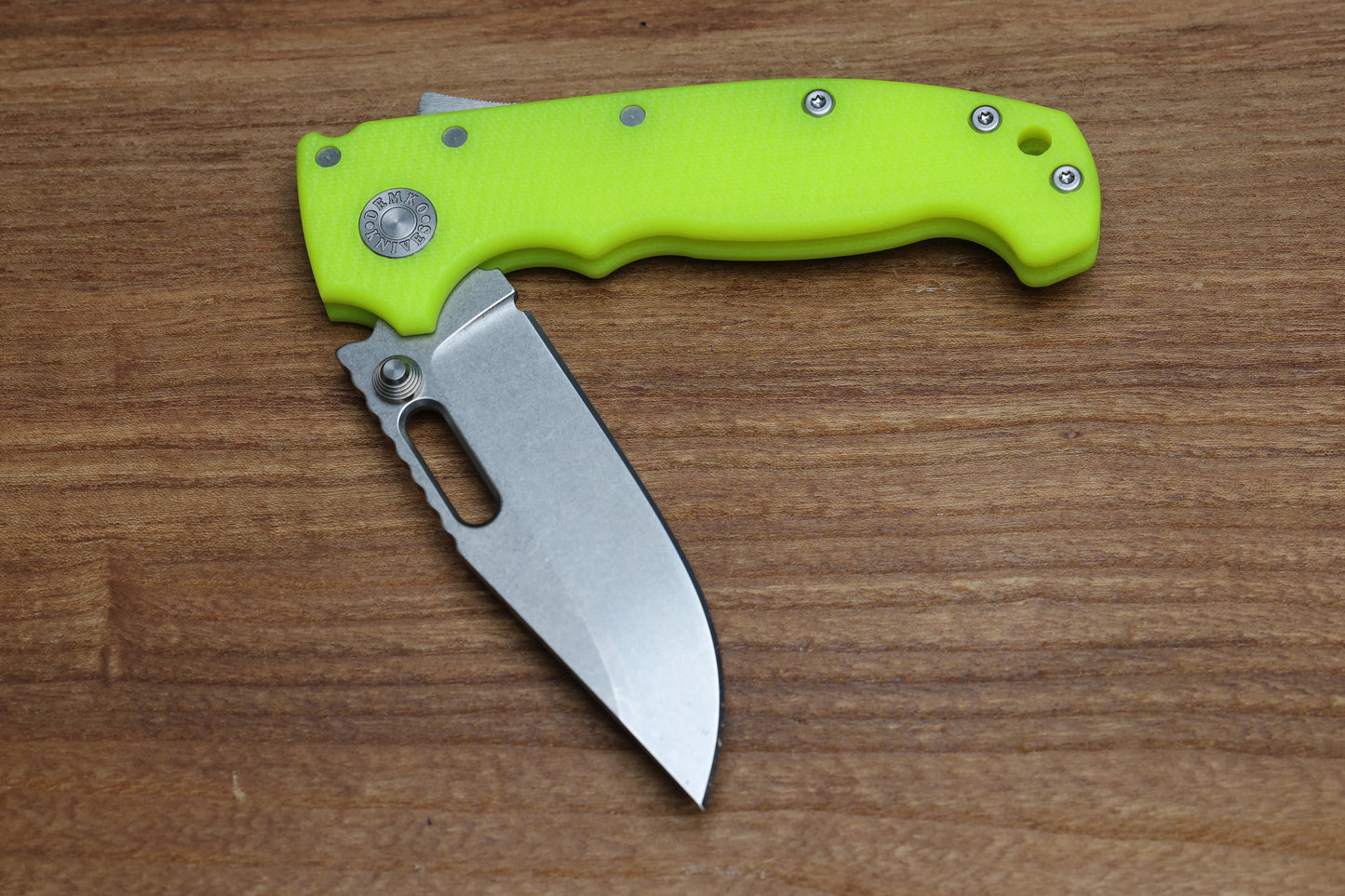 DEMKO KNIVES MG AD20S W/ TEXTURED DAY GLOW G10 HANDLES & 20CV CLIP POINT