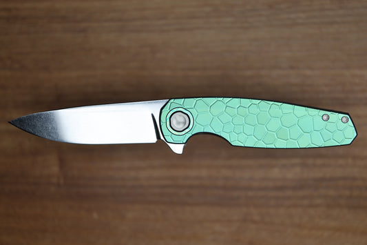 HOLT BLADEWORKS MORPHEUS - BURNISHED ANO TURTLE TITANIUM PATTERN WITH UDDEHOLM VANAX SUPERCLEAN BLADE #1925