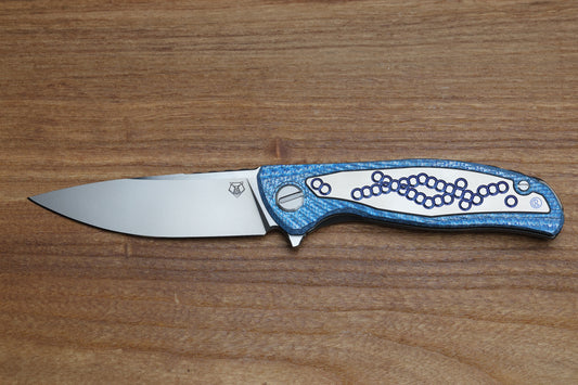 SHIROGOROV KNIVES "SPECIAL EDITION" CHRIS REEVE COLLABORATION HATI CGG - MAGNACUT BLADE - TITANIUM/BLUE ALUTEX HANDLE - MRBS