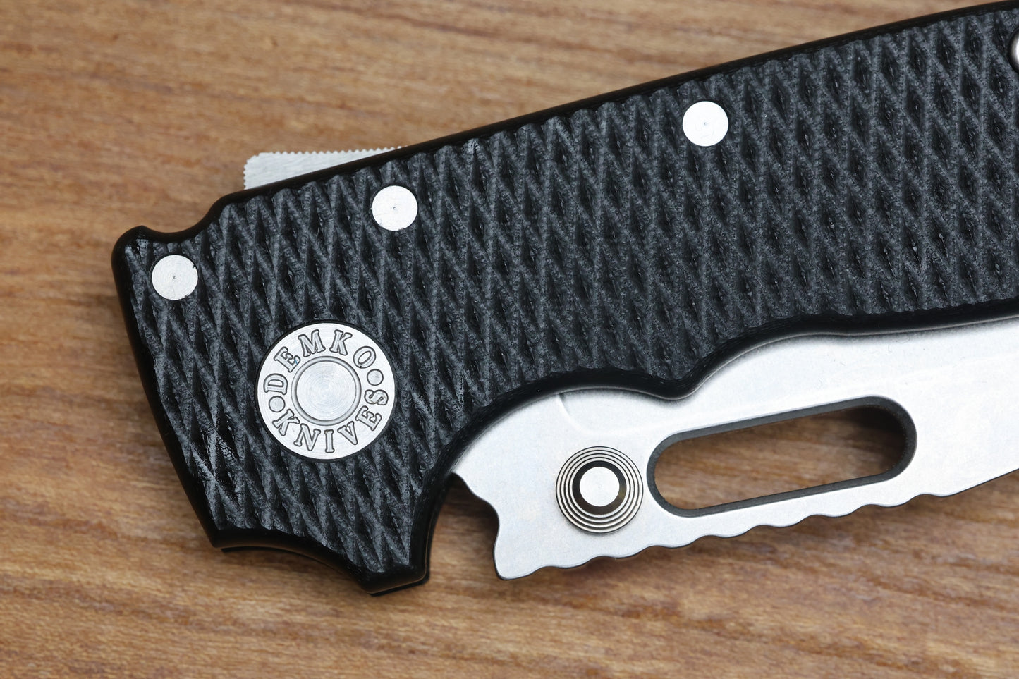 DEMKO KNIVES MG AD20S W/TEXTURED BLACK G10 HANDLES & MAGNACUT CLIP POINT BLADE
