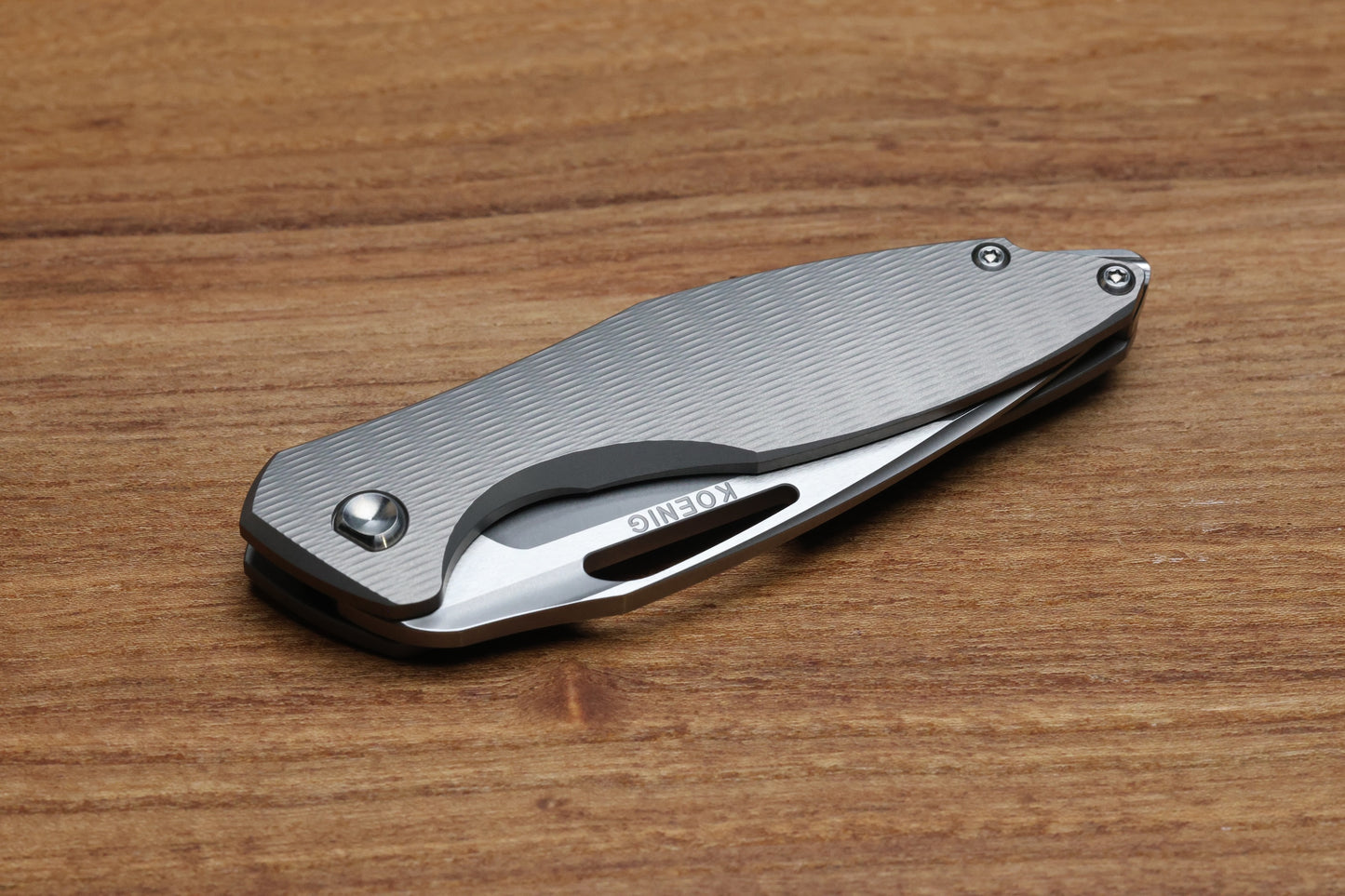 KOENIG KNIVES MINI ARIUS - NON FLIPPER - PLEXA TITANIUM HANDLE - SILVER HARDWARE - BURNISHED W/ POLISHED FLATS M390 BLADE