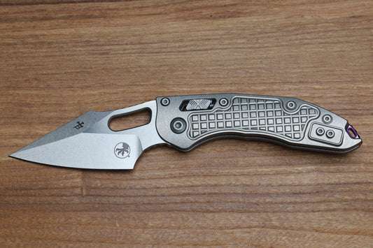 MICROTECH MARFIONE SELECT MANUAL STITCH RAM LOK FRAG TITANIUM HANDLES & STONEWASH M390MK W/ DOUBLE VAPOR BLAST & PURPLE ACCENTS 169RL-10FRMS3