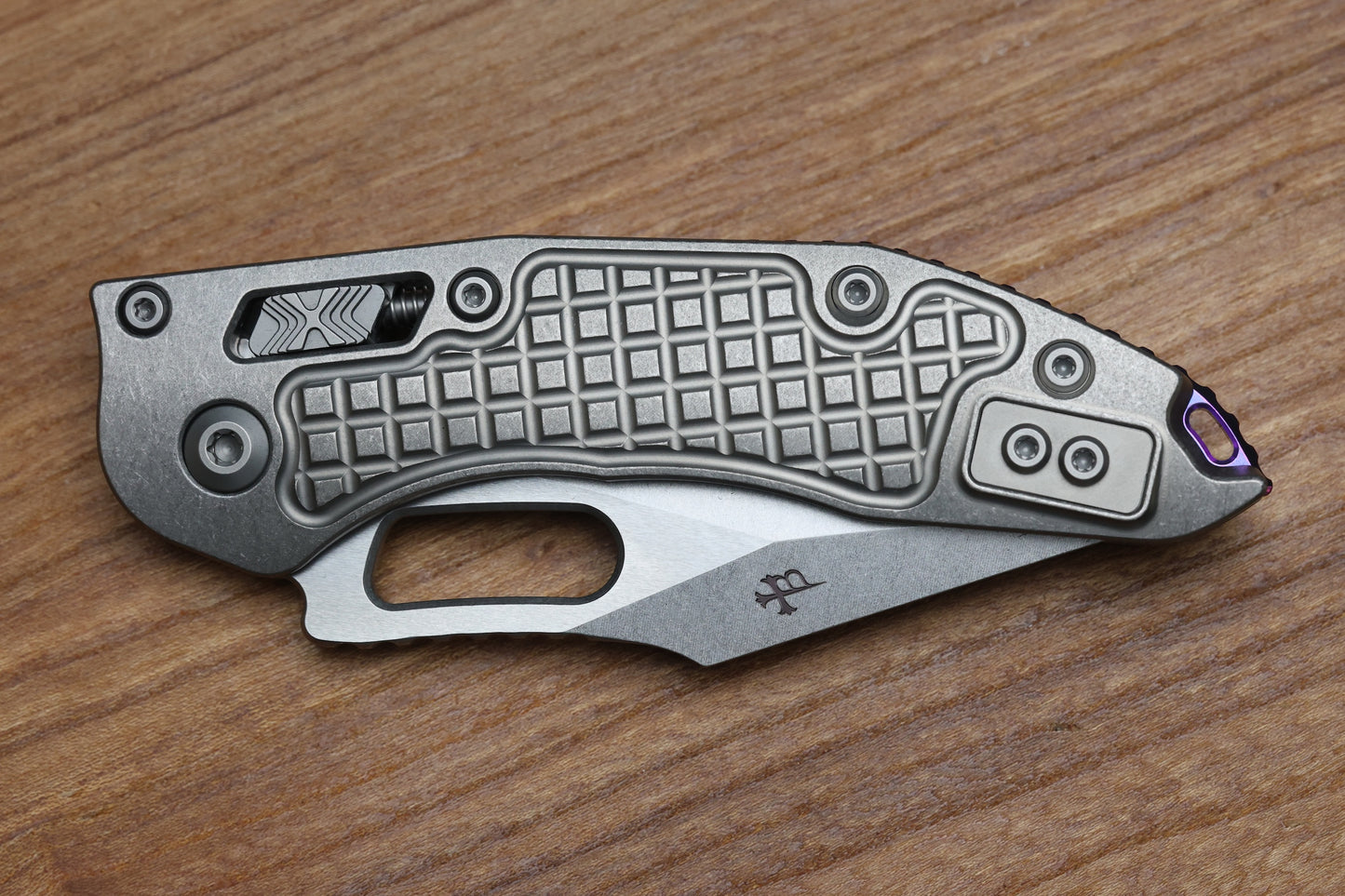 MICROTECH MARFIONE SELECT MANUAL STITCH RAM LOK FRAG TITANIUM HANDLES & STONEWASH M390MK W/ DOUBLE VAPOR BLAST & PURPLE ACCENTS 169RL-10FRMS3
