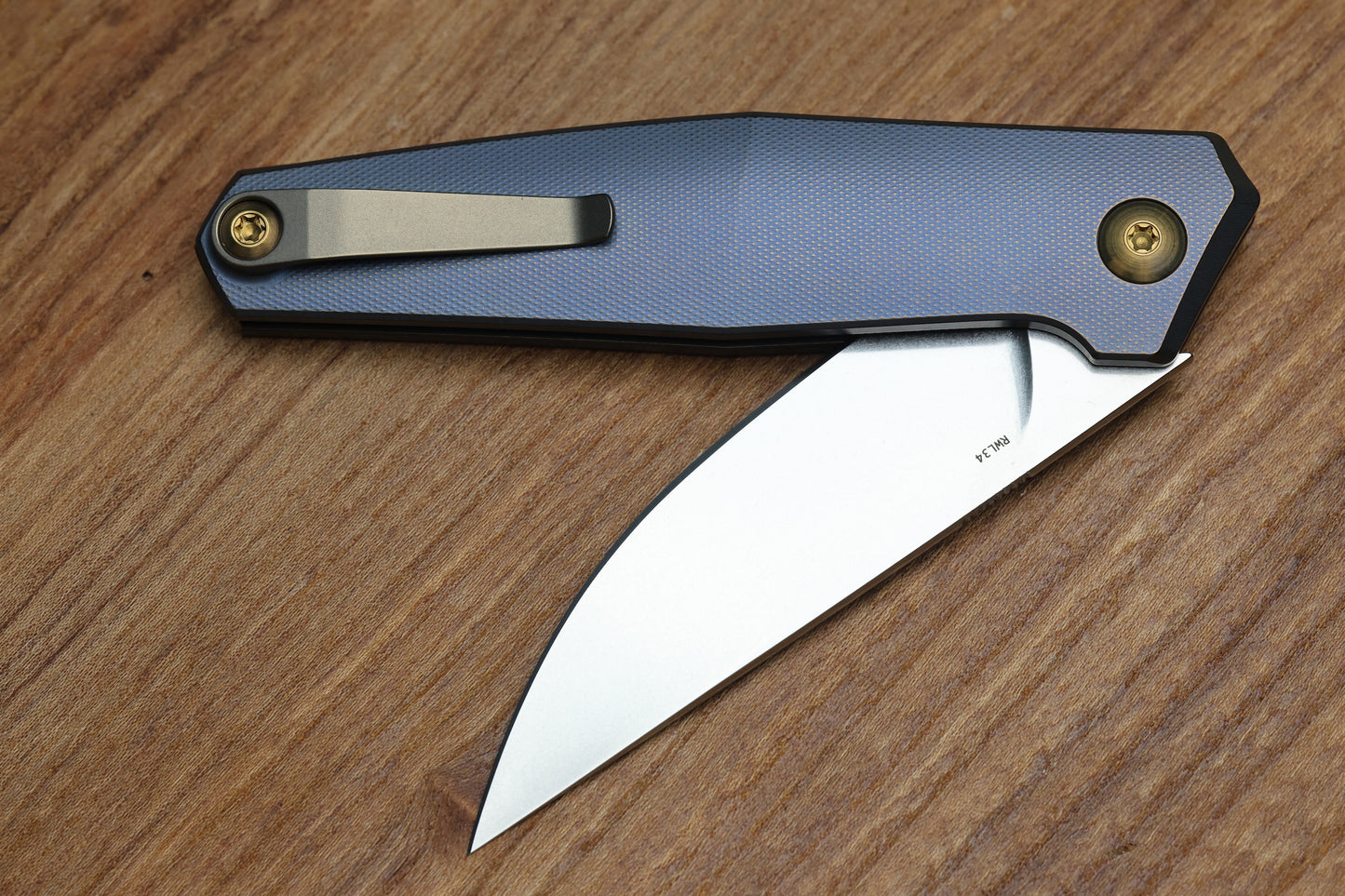 ANSO OF DENMARK TOKO - KOBOLT/AMBER TITANIUM HANDLE - RWL34 BLADE