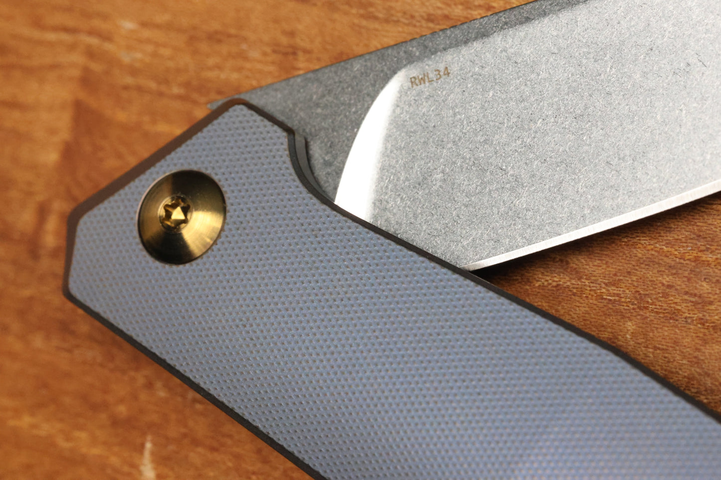 ANSO OF DENMARK TOKO - KOBOLT/AMBER TITANIUM HANDLE - RWL34 BLADE