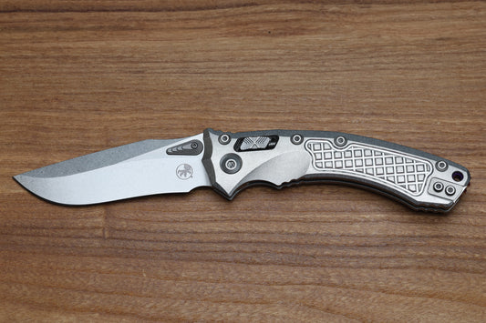 MICROTECH MARFIONE SELECT AMPHIBIAN RAM LOK TITANIUM FRAG HANDLES & STONEWASH M390MK W/ DOUBLE VAPOR BLAST & PURPLE ACCENTS 137RL-10FRMS3