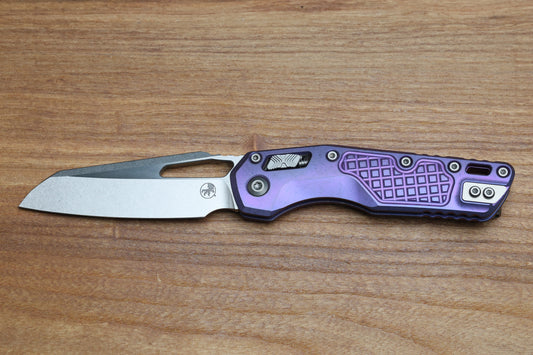 MICROTECH MARFIONE SELECT MSI RAM LOK PURPLE HAZE FRAG TITANIUM HANDLES W/ PURPLE ACCENTS & STONEWASH M390MK 210-10FRMS5