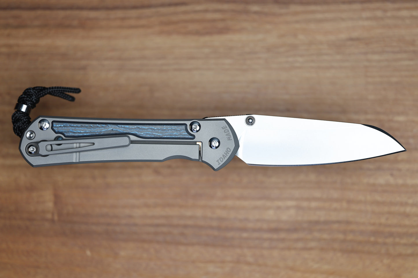 CHRIS REEVE LARGE SEBENZA 31 - OCEAN BLUE CARBOTI INLAY - INSINGO CPM MAGNACUT BLADE - MIM CLIP - SILVER DOUBLE THUMB LUGS