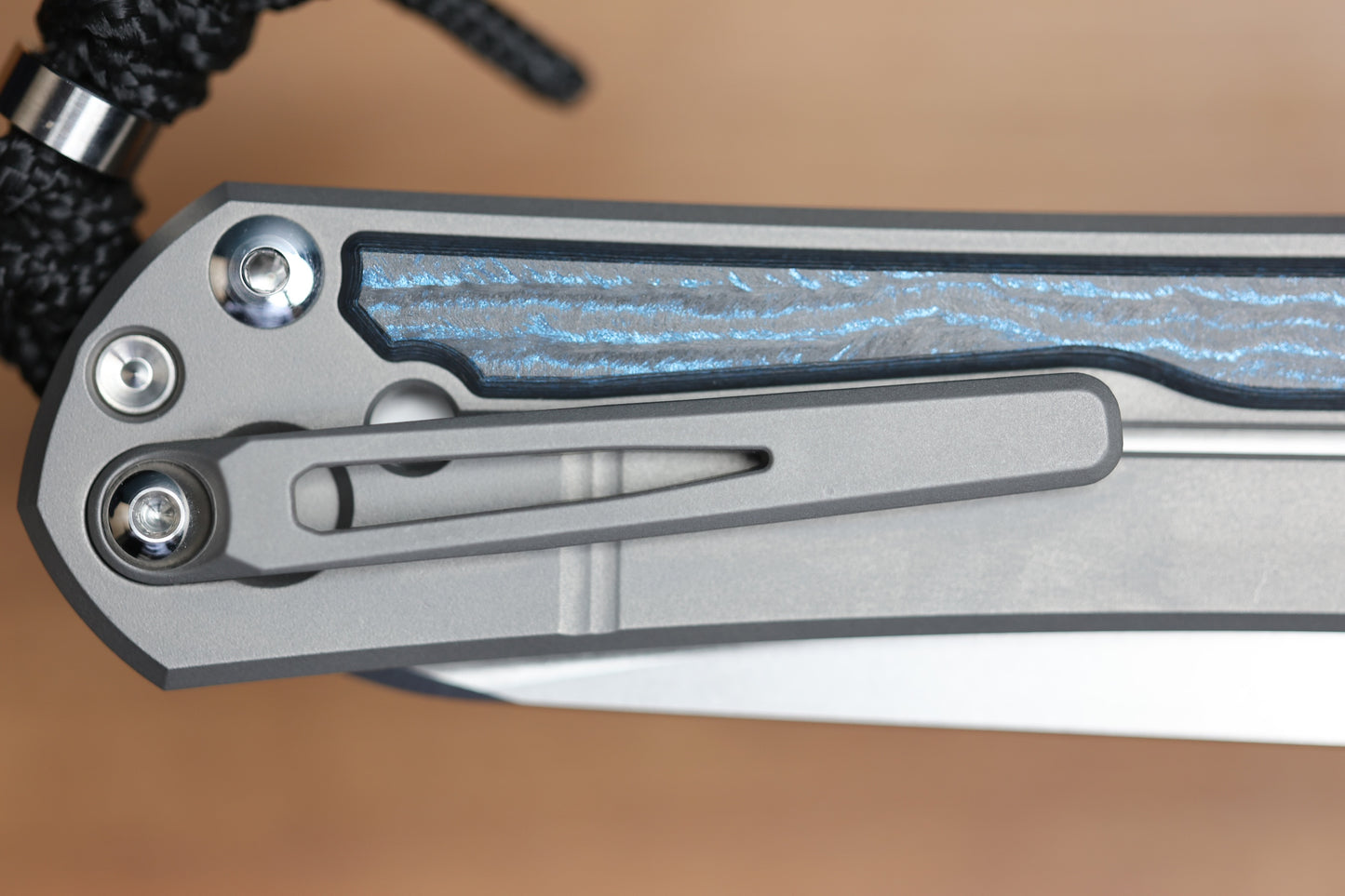 CHRIS REEVE LARGE SEBENZA 31 - OCEAN BLUE CARBOTI INLAY - INSINGO CPM MAGNACUT BLADE - MIM CLIP - SILVER DOUBLE THUMB LUGS