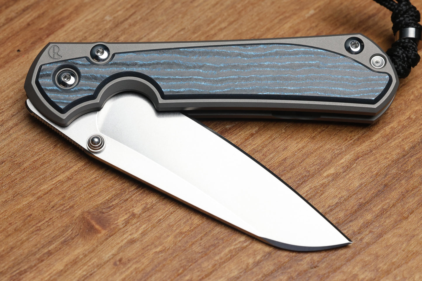 CHRIS REEVE LARGE SEBENZA 31 - OCEAN BLUE CARBOTI INLAY - INSINGO CPM MAGNACUT BLADE - MIM CLIP - SILVER DOUBLE THUMB LUGS