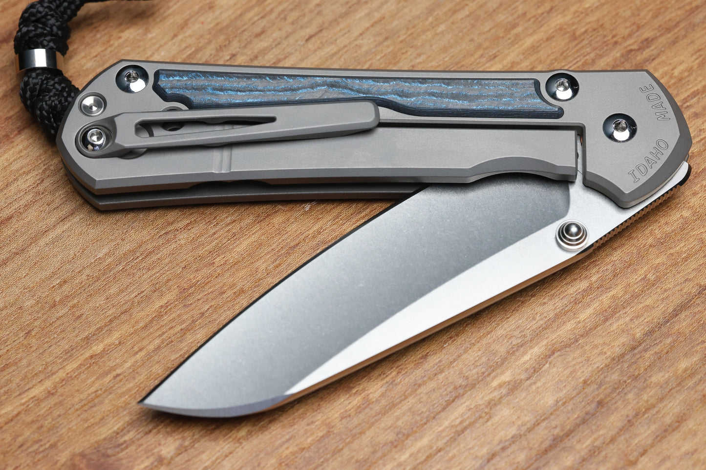 CHRIS REEVE LARGE SEBENZA 31 - OCEAN BLUE CARBOTI INLAY - INSINGO CPM MAGNACUT BLADE - MIM CLIP - SILVER DOUBLE THUMB LUGS