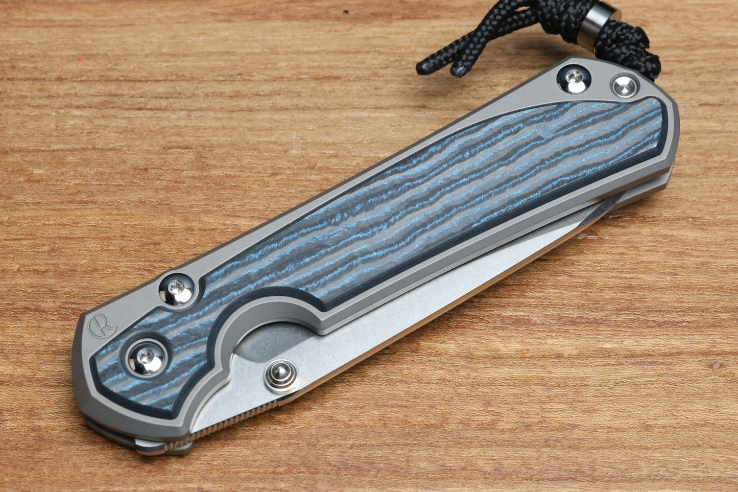 CHRIS REEVE LARGE SEBENZA 31 - OCEAN BLUE CARBOTI INLAY - INSINGO CPM MAGNACUT BLADE - MIM CLIP - SILVER DOUBLE THUMB LUGS