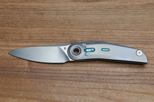 REATE KNIVES VULPEX VK TRON- TITANIUM BEAD BLAST W/CYAN BLUE ACCENTS & M390 BLADE