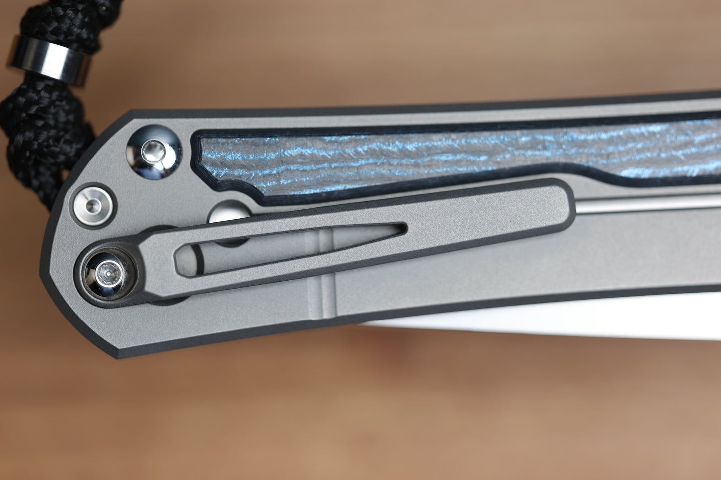CHRIS REEVE LARGE SEBENZA 31 - OCEAN BLUE CARBOTI INLAY - TANTO CPM MAGNACUT BLADE - MIM CLIP - SILVER DOUBLE THUMB LUGS