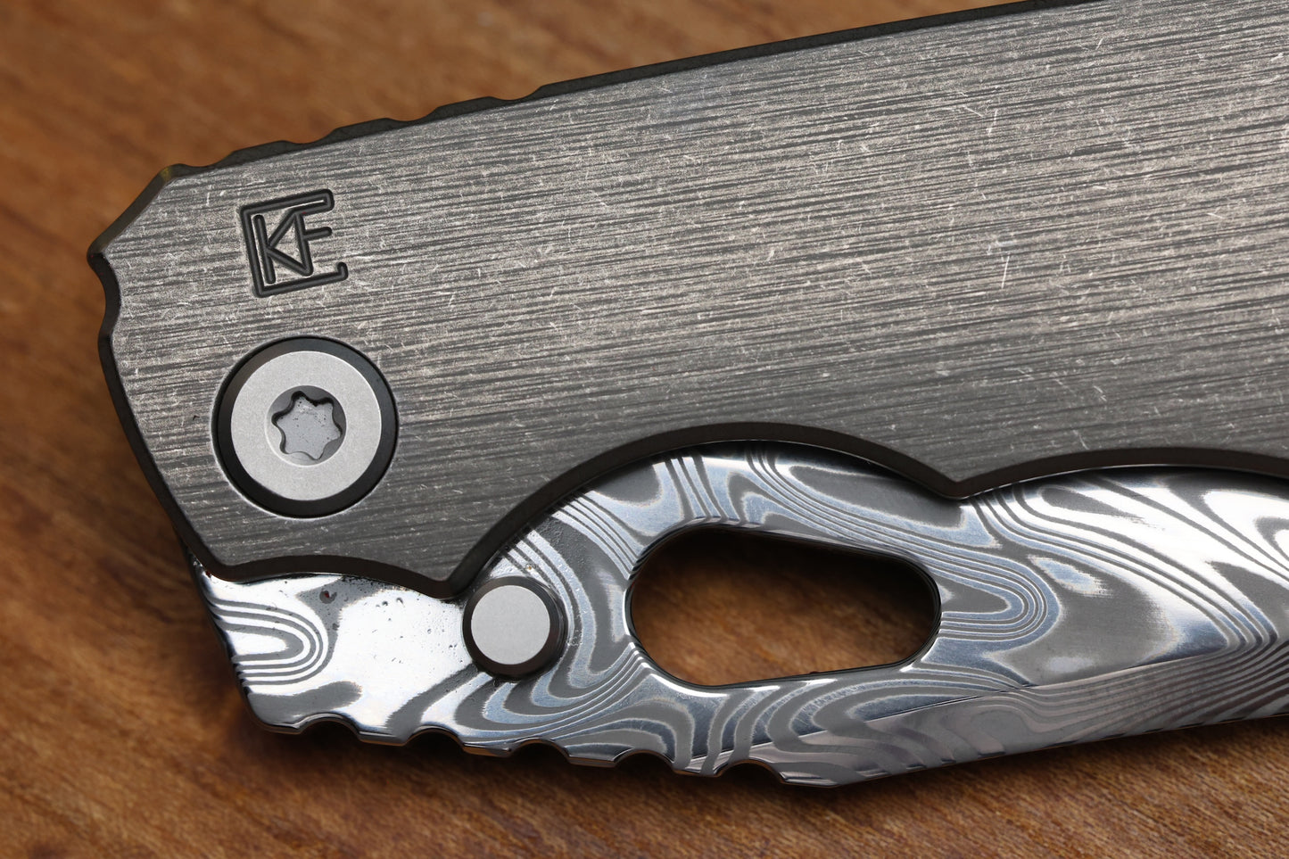 CUSTOM KNIFE FACTORY & ROTTEN DESIGN EVO 1.1 TUMBLED TI HANDLES W/ DAMASTEEL