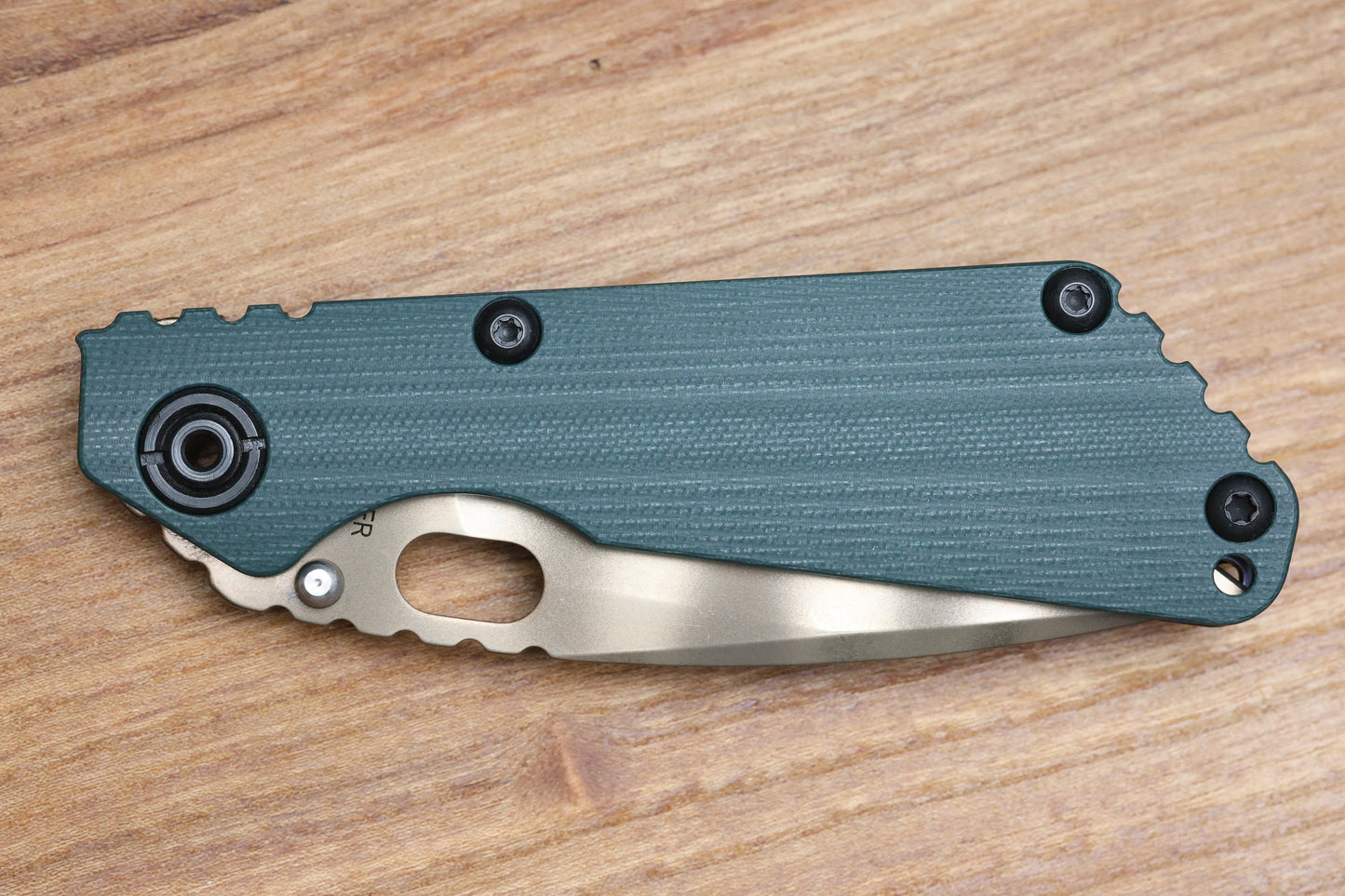 STRIDER KNIVES SNG - ANODIZED TITANIUM/FOREST GREEN G10 HANDLE - DROP POINT BRONZE TIGER STRIPE 20CV BLADE